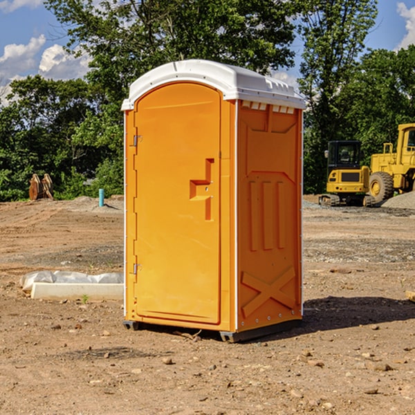 how often are the portable restrooms cleaned and serviced during a rental period in Netawaka